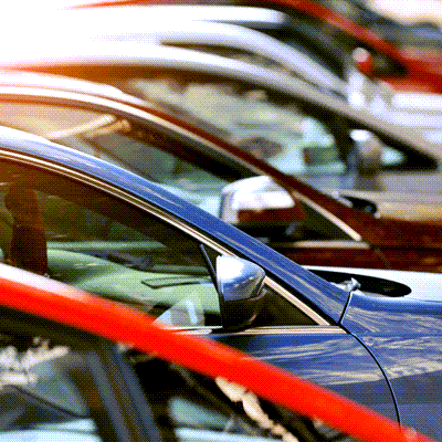 Group of cars parked in a row